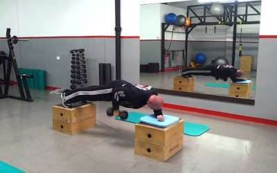 Entrenamiento de Core: plancha facial con remo a un brazo